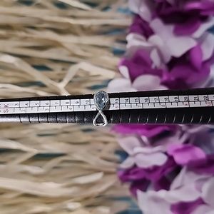 Size 5.5 Beautiful Blue Topaz in a sterling silver setting. NWOT